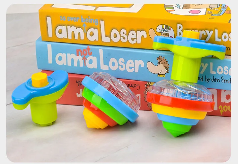 UFO Flashing Spinning Top Kids Gyro Light Up Toy Kids Piggy LED Music Gyroscope Launcher Rotating Toys Fun Birthday Party Favors