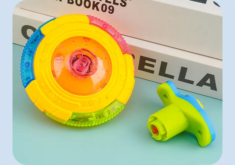UFO Flashing Wing Spinning Top Kids Gyro Light Up Toy Kids LED Music Gyroscope Launcher Rotating Toys Fun Birthday Party Favors