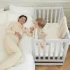 MAMAZING 11-In-1 Convertible Mini Cradle to Full Size Crib Removable Wheels 4 Adjustable Heights (WHITE)